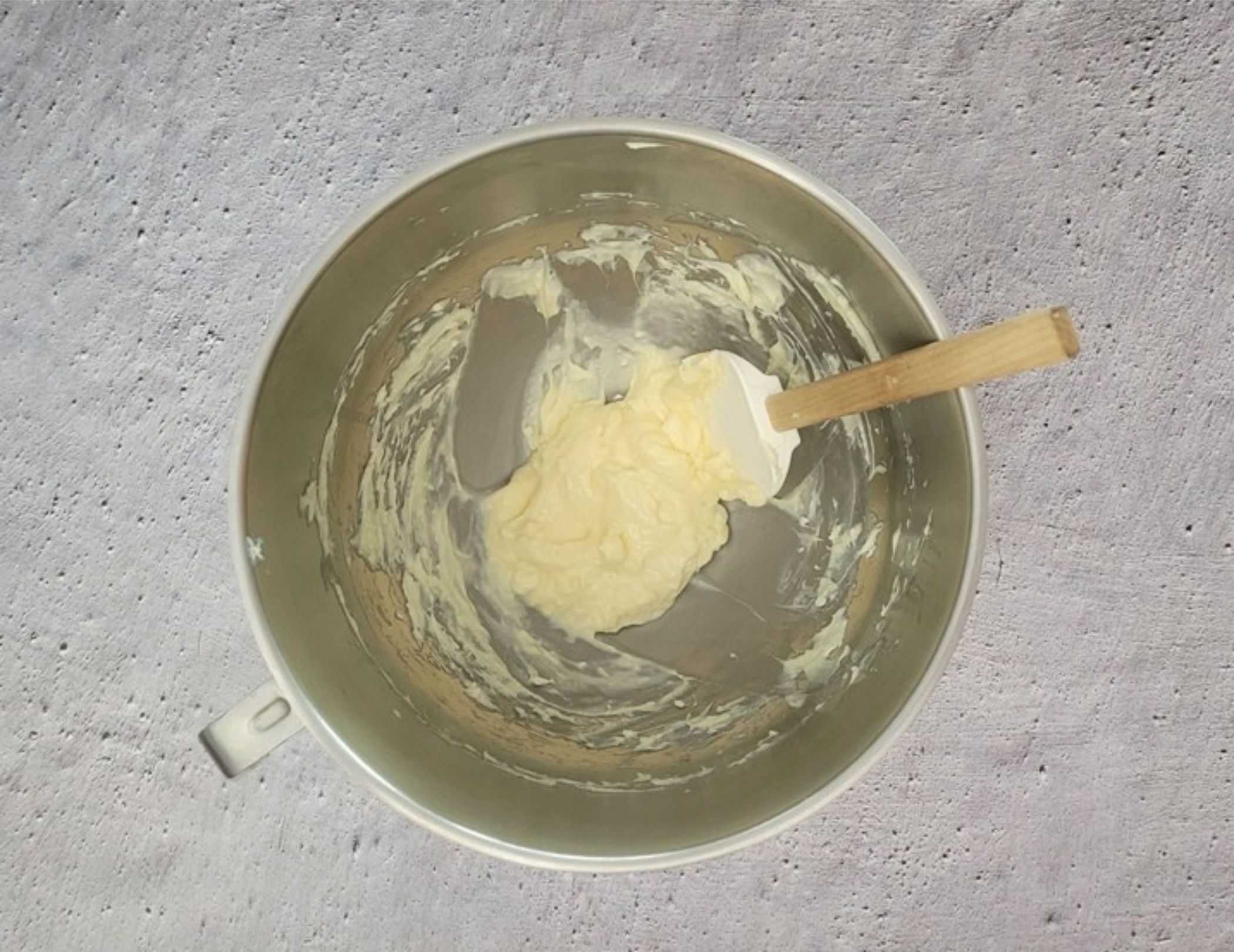 mixing bowl with melted gelatin added to the cream cheese mixture