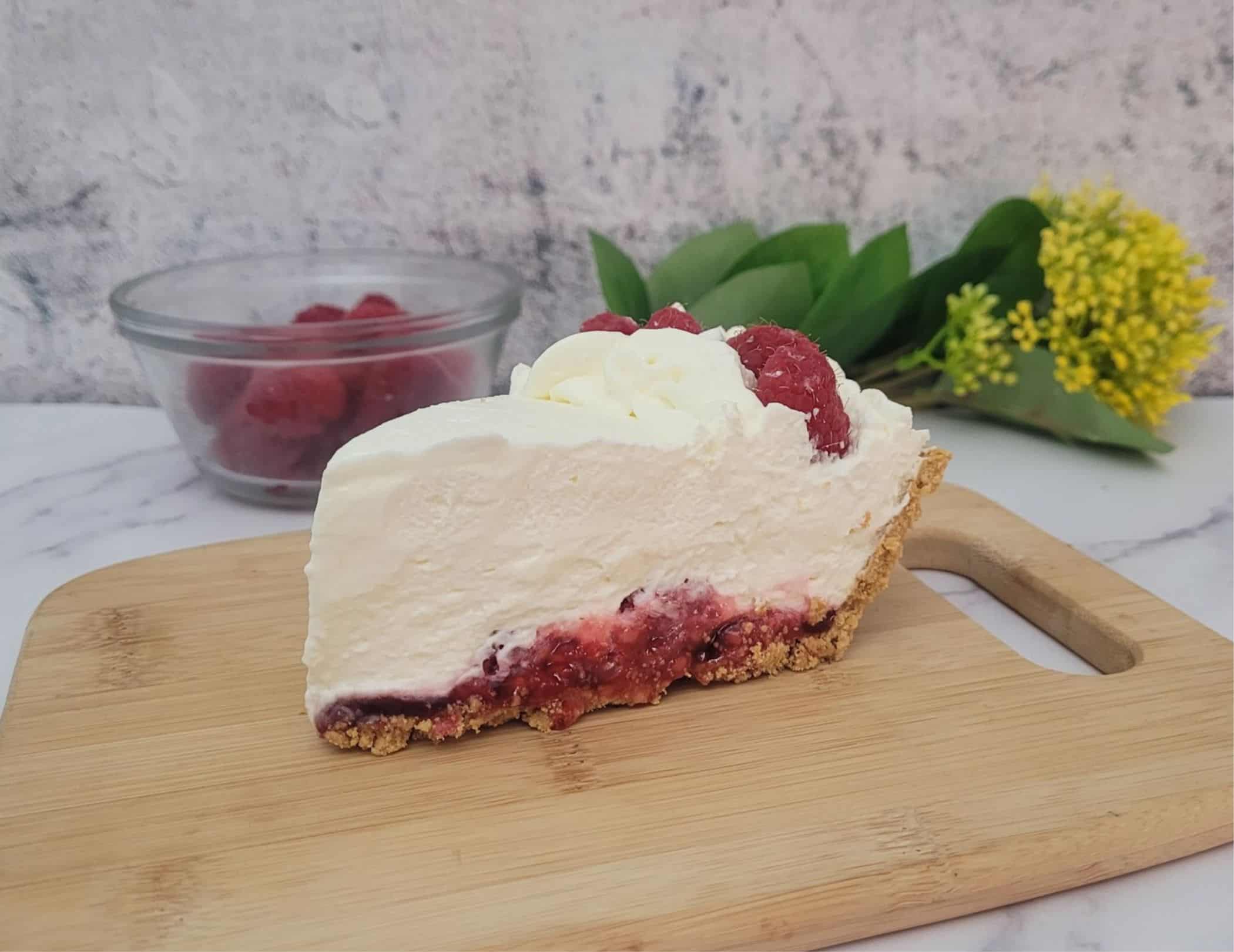 slice of raspberry cream pie made with a no-bake recipe