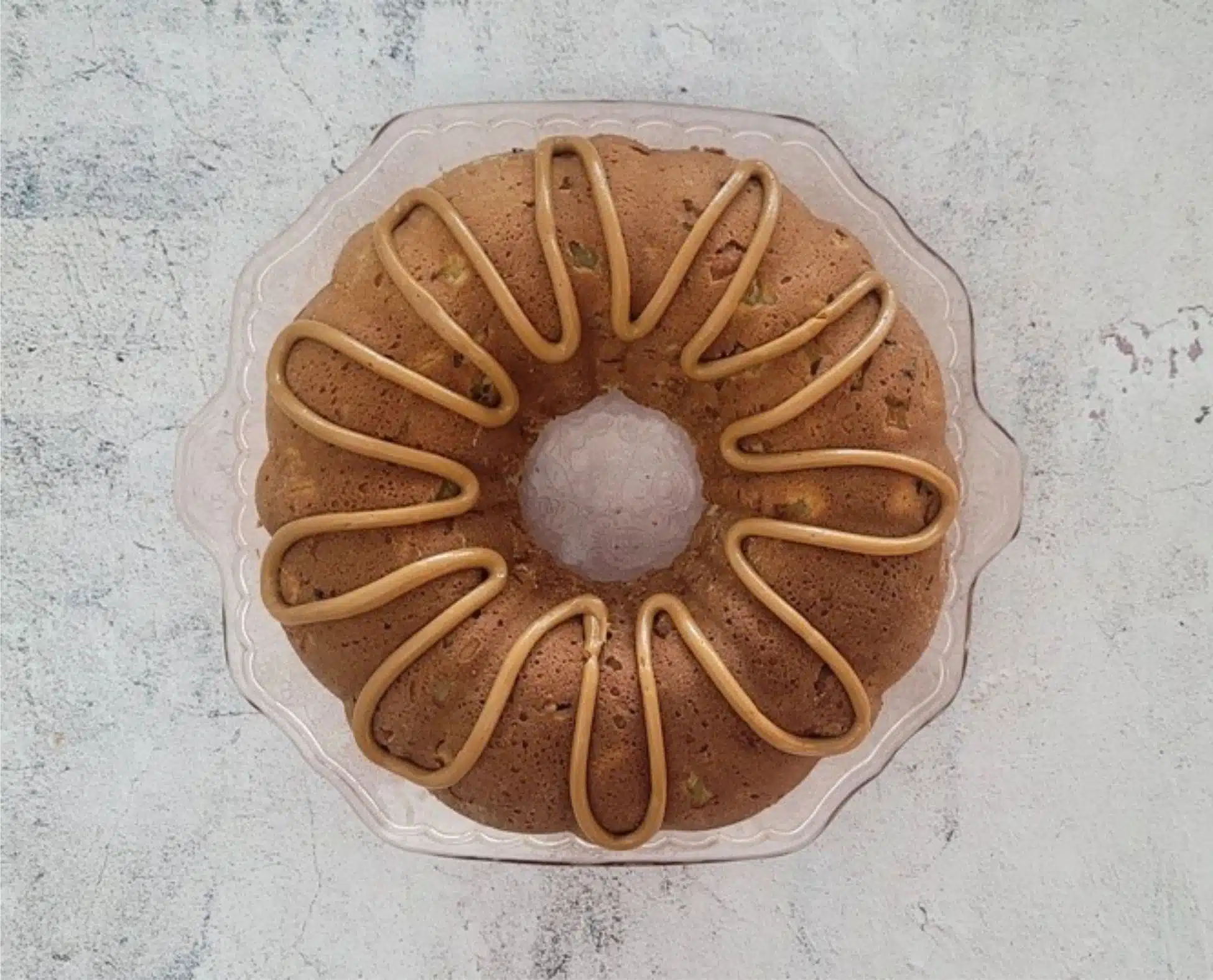 finished Bundt cake with caramel drizzled over the top