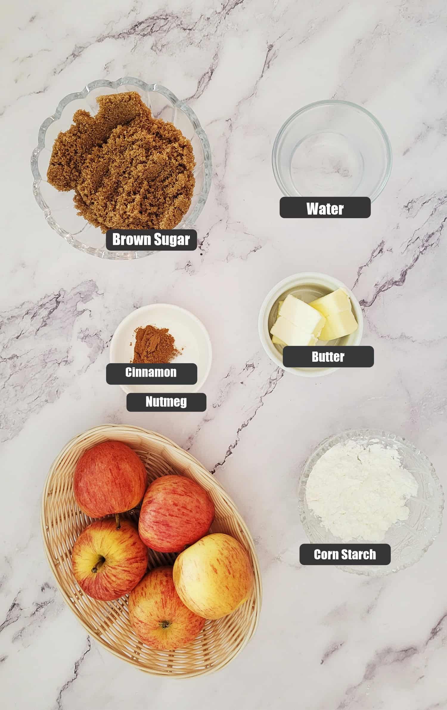 ingredients needed to make an apple filling recipe including apples, cornstarch, brown sugar, butter, water and ground cinnamon