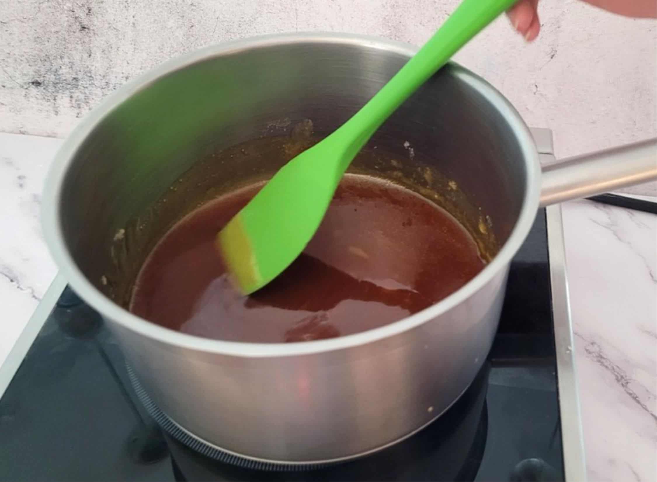 caramel in saucepan heated until amber in color