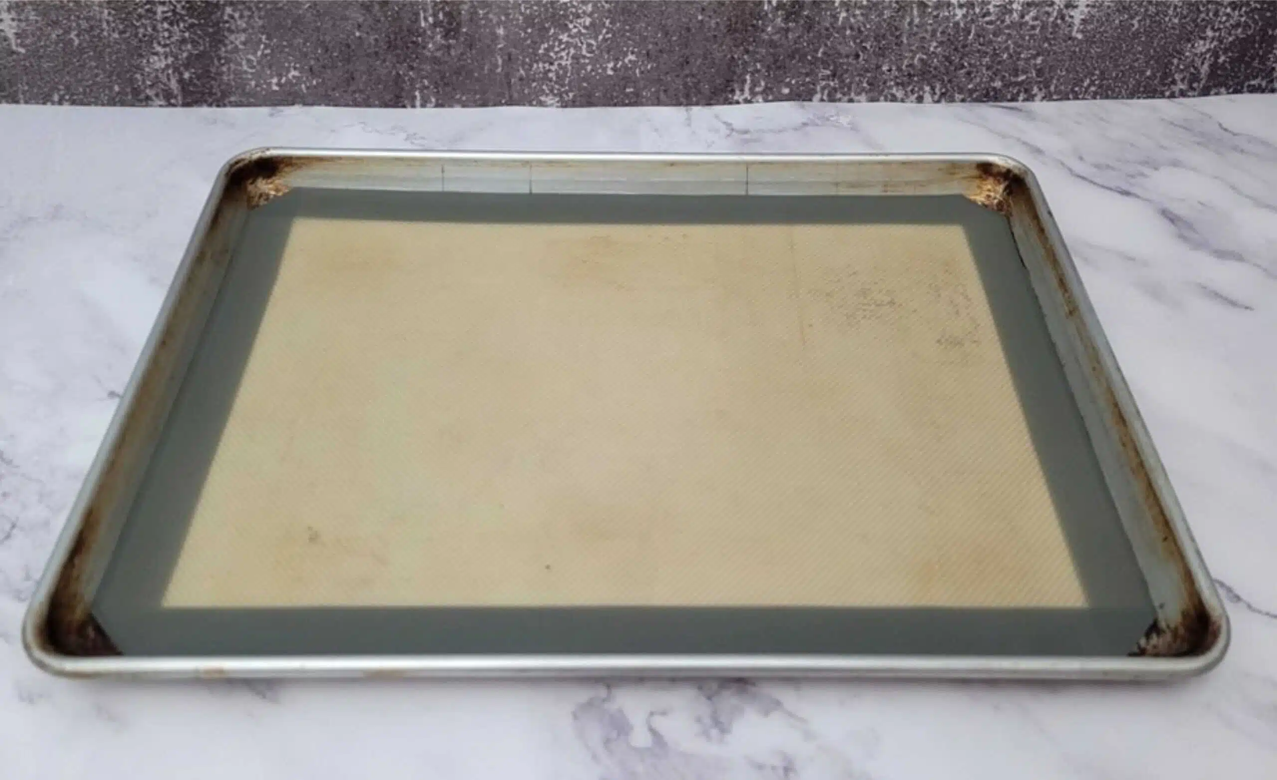 sheet pan with a silicone mat