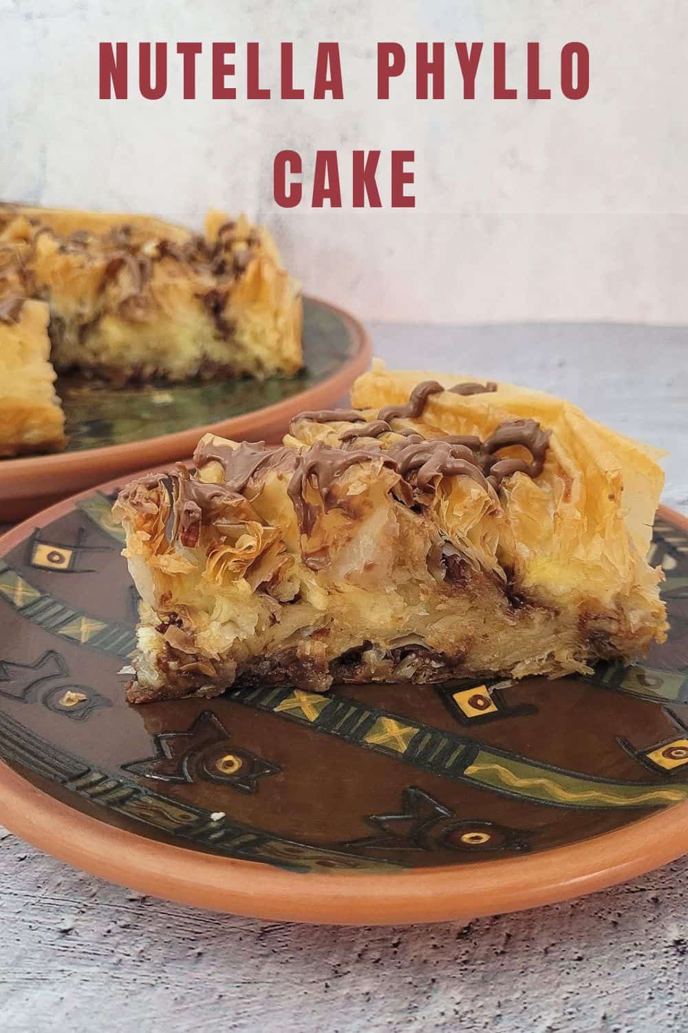 close up of a slice of crinkle cake with Nutella and hazelnuts