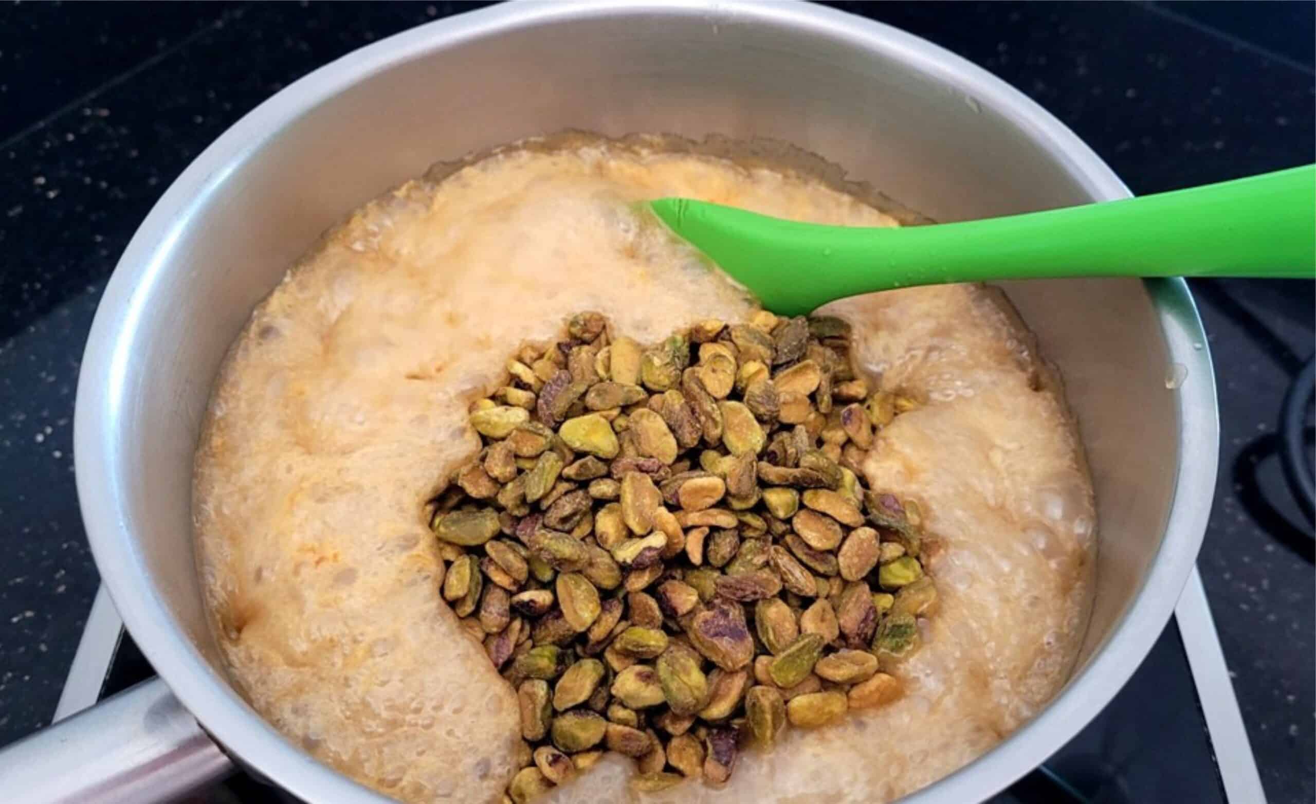 add baking soda and pistachios to hot caramel