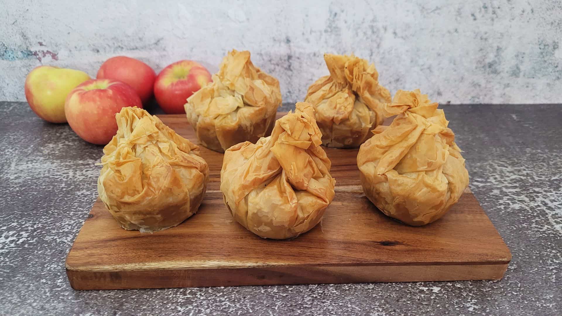 finished apple baklava placed on a wooden board