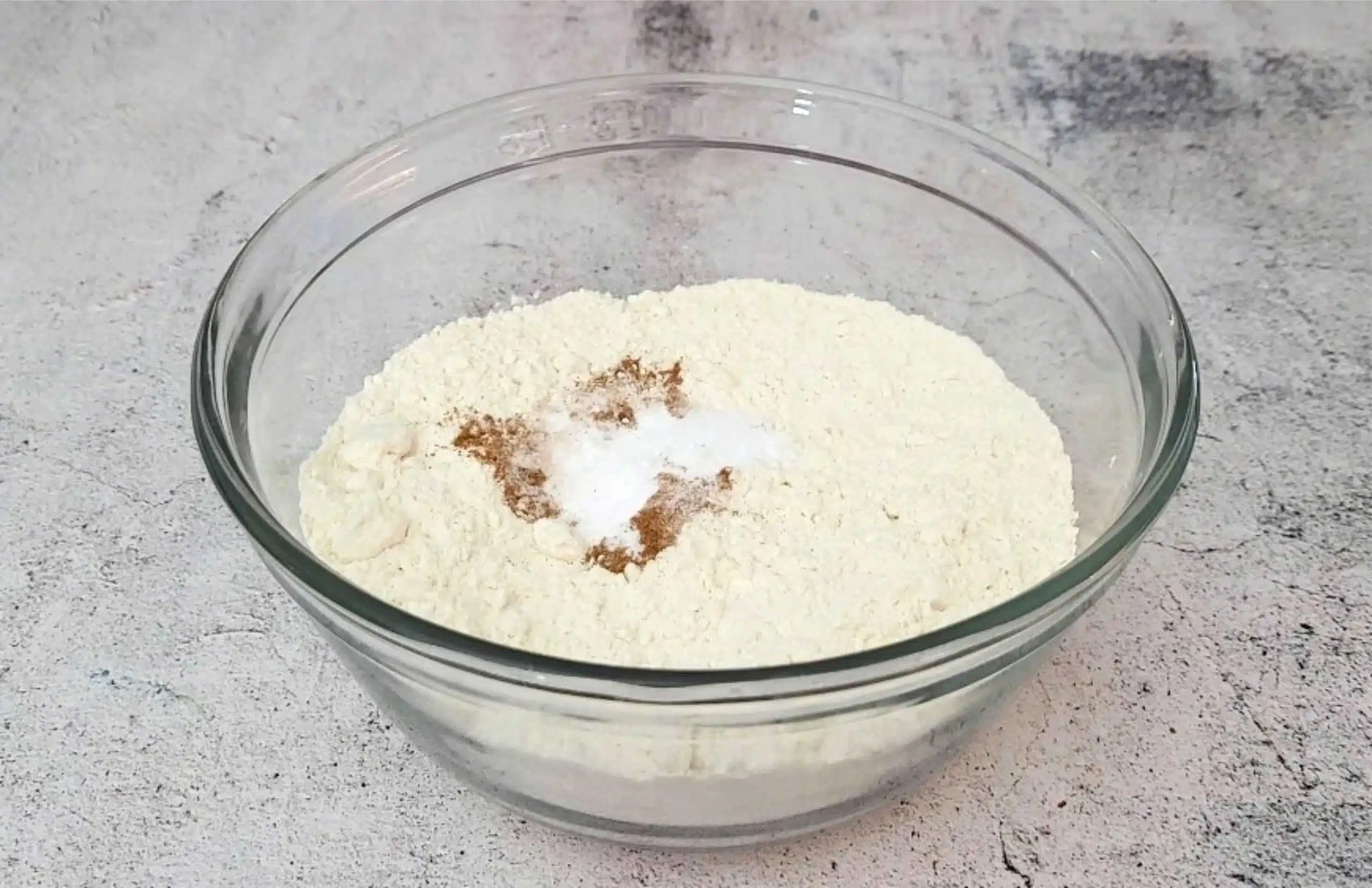 flour, baking soda, cinnamon and salt stirred together in a bowl