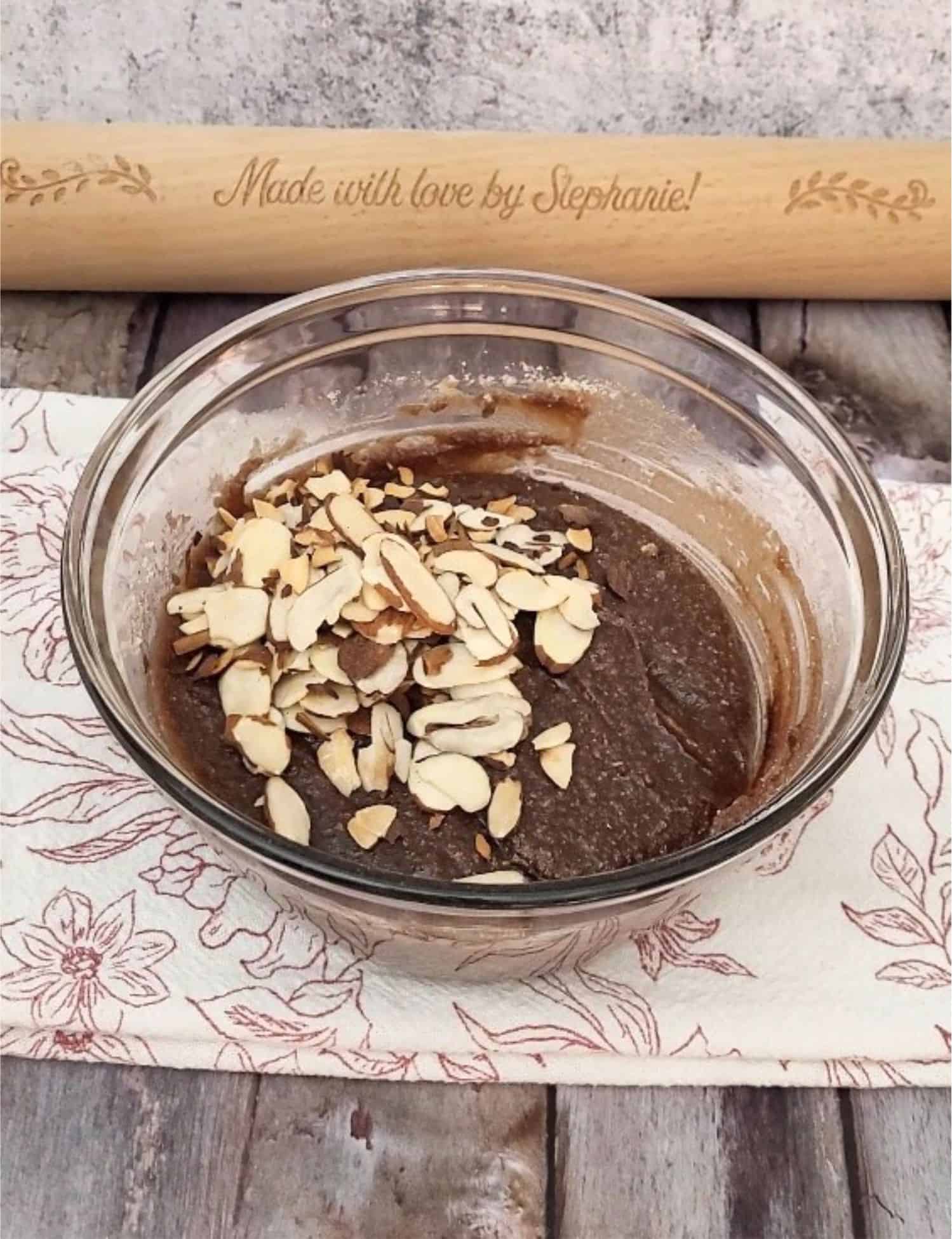 chocolate and almond filling being mixed together in a bowl