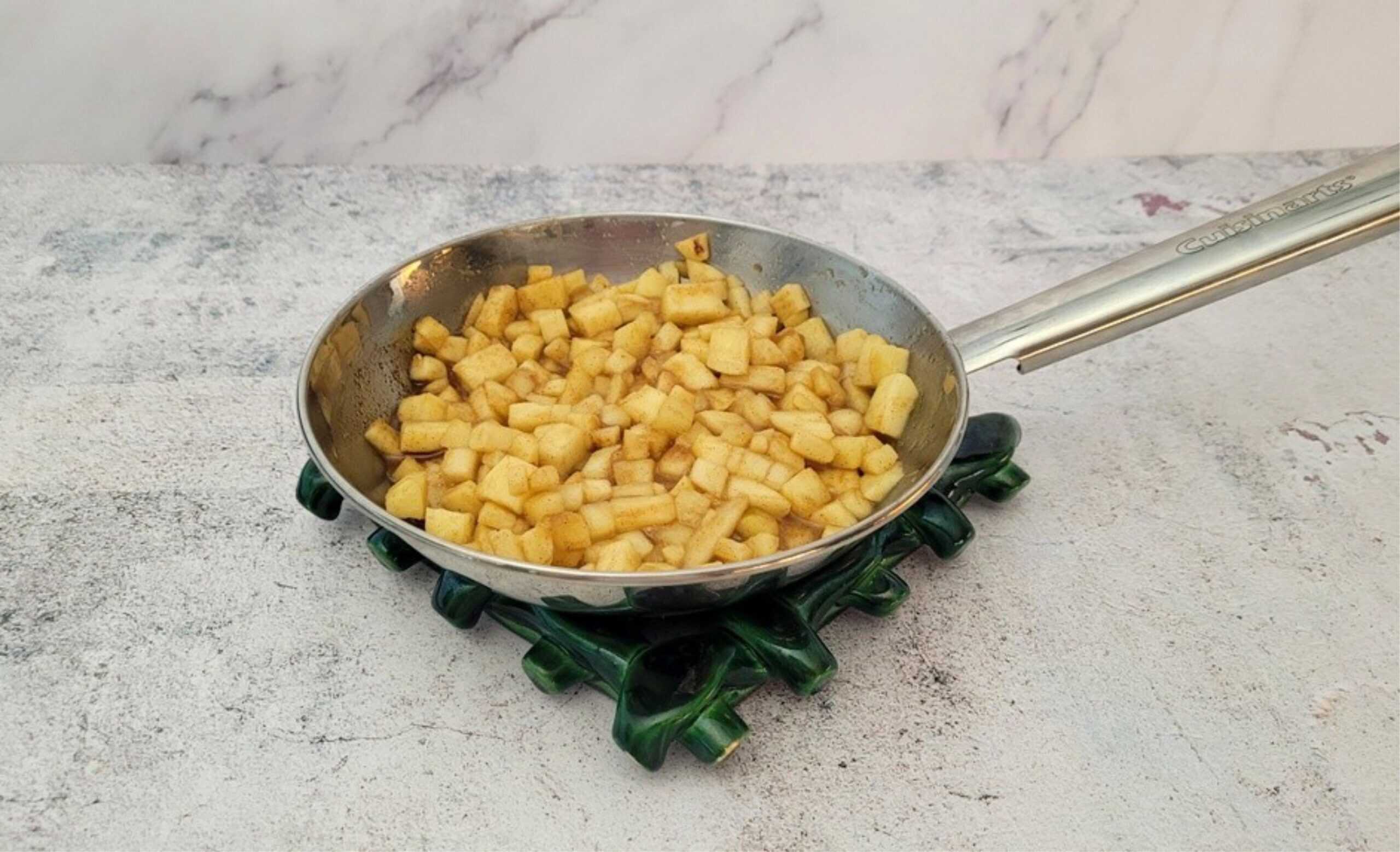 apples prepared and in a saucepan to use for filling