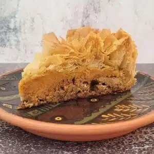 close up view of a slice of pumpkin baklava on a plate