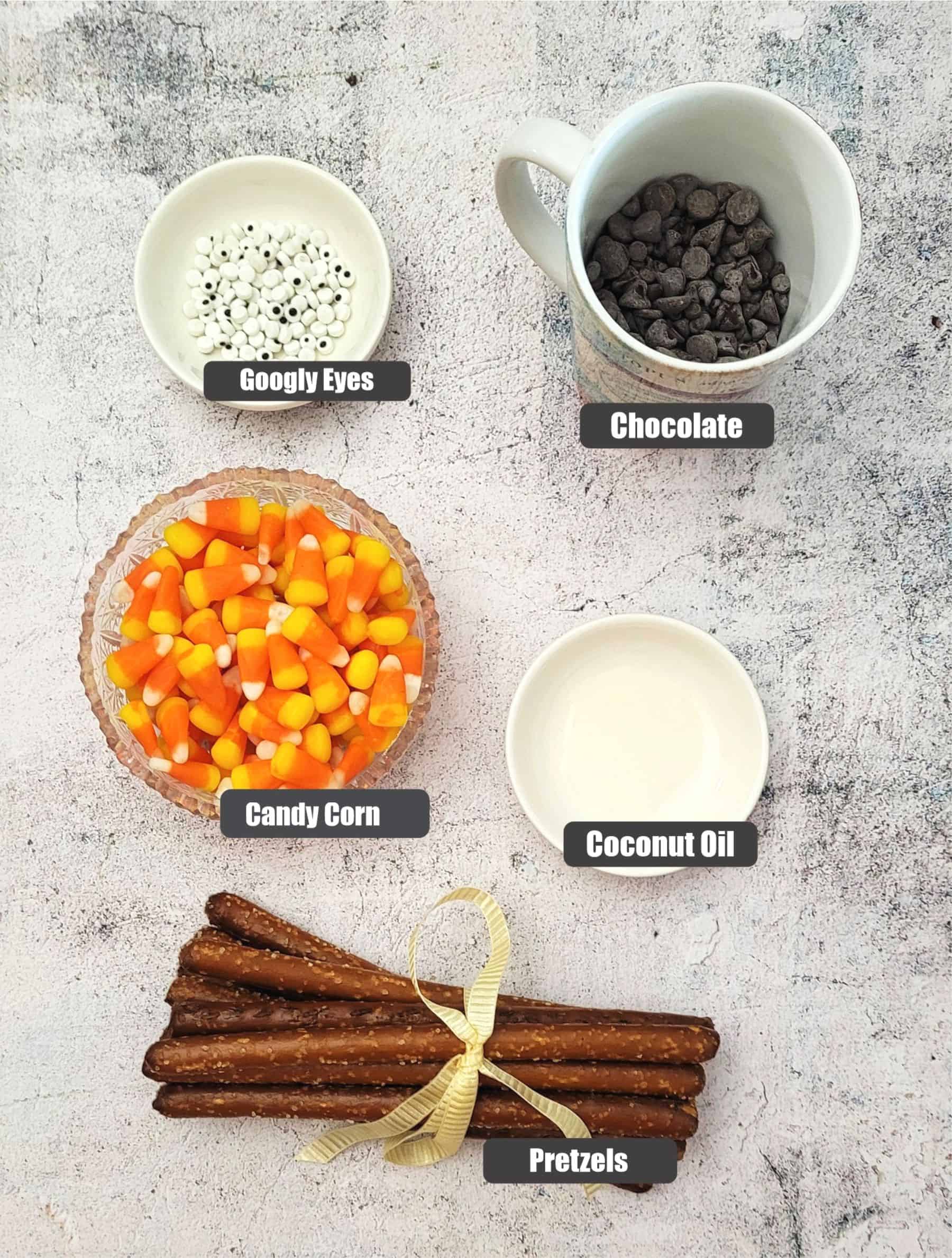 ingredients needed to make turkey pretzels including coconut oil, candy corn, chocolate, coconut oil and googly eyes