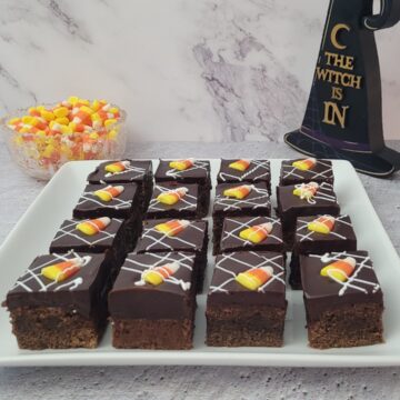 pieces of Halloween candy corn brownies on a platter