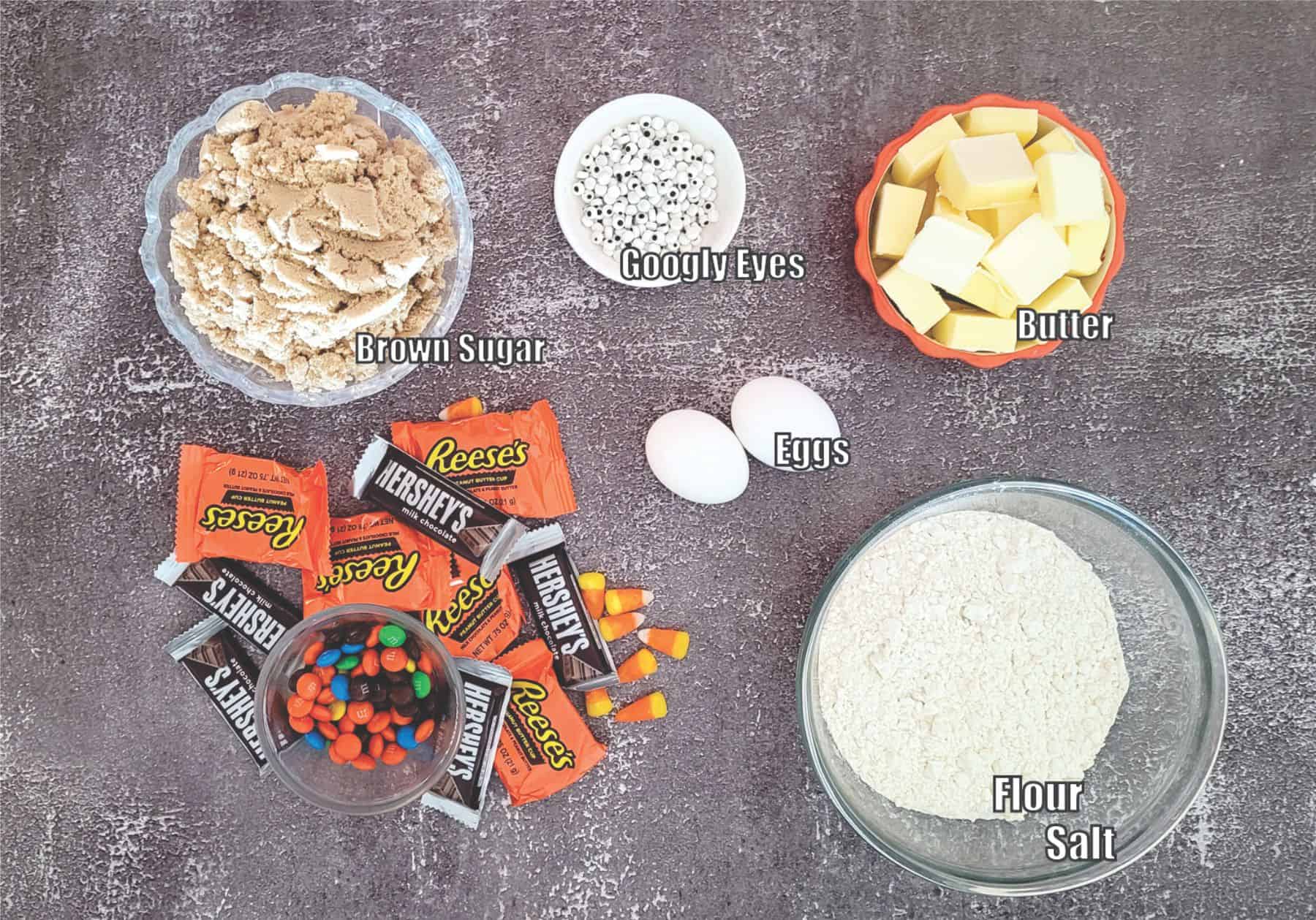 ingredients needed for Halloween Brown Butter Blondies including flour, salt, eggs, googly eyes, brown sugar, butter and leftover Halloween candy