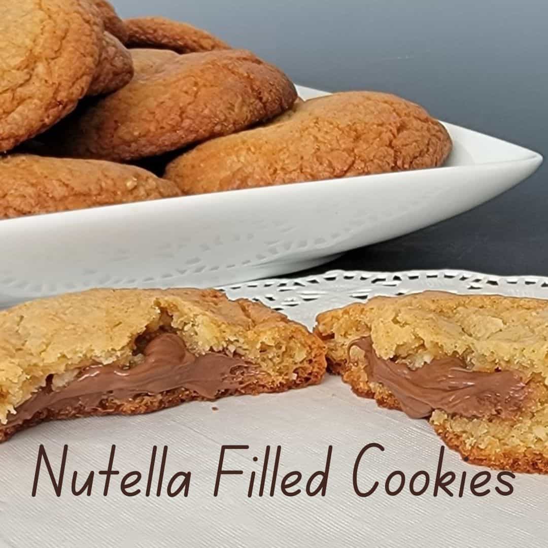 closeup view of hazelnut cookies with Nutella filling oozing out