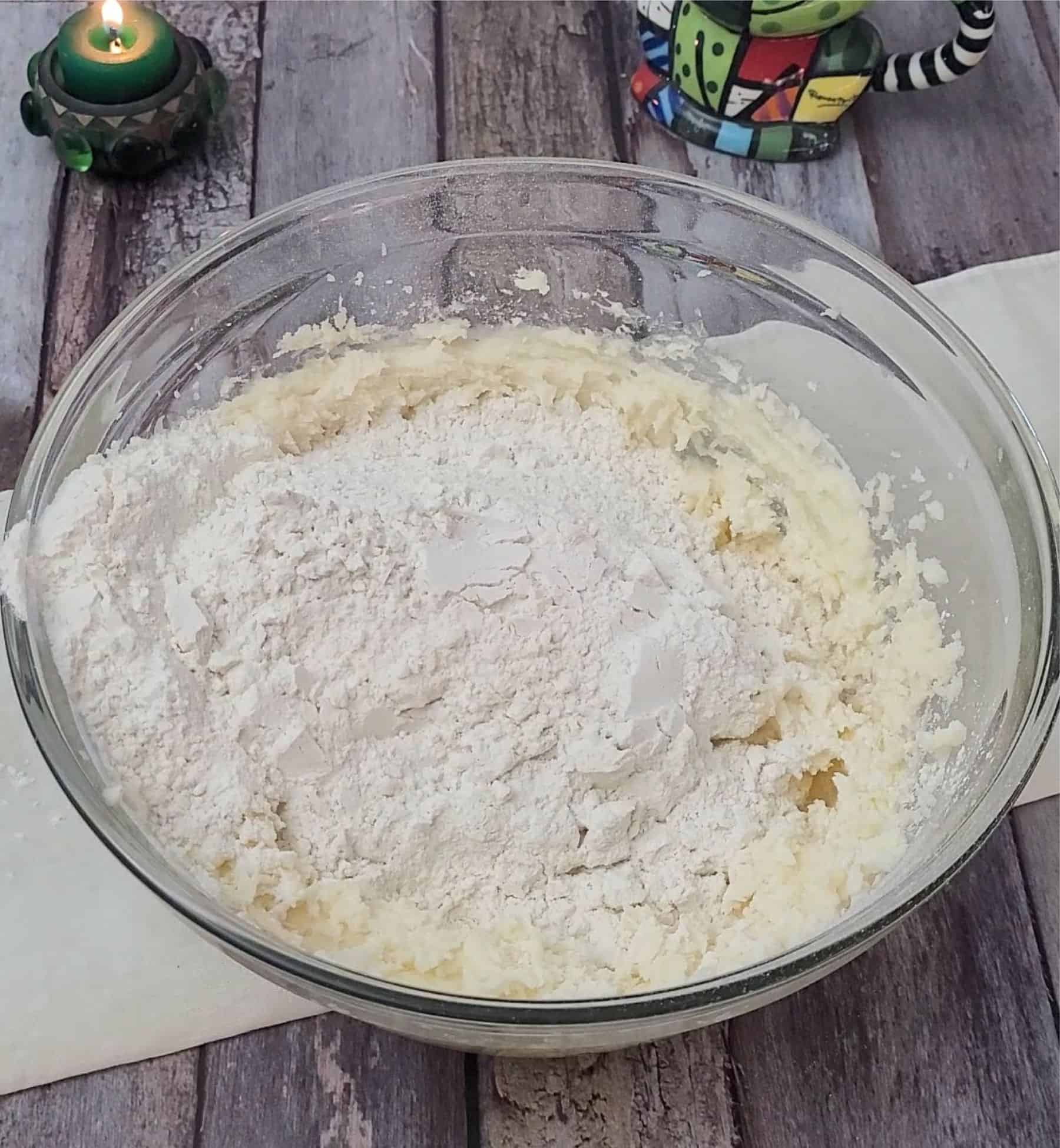 dry ingredients added to mixing bowl to make base of chocolate coconut cookie bars