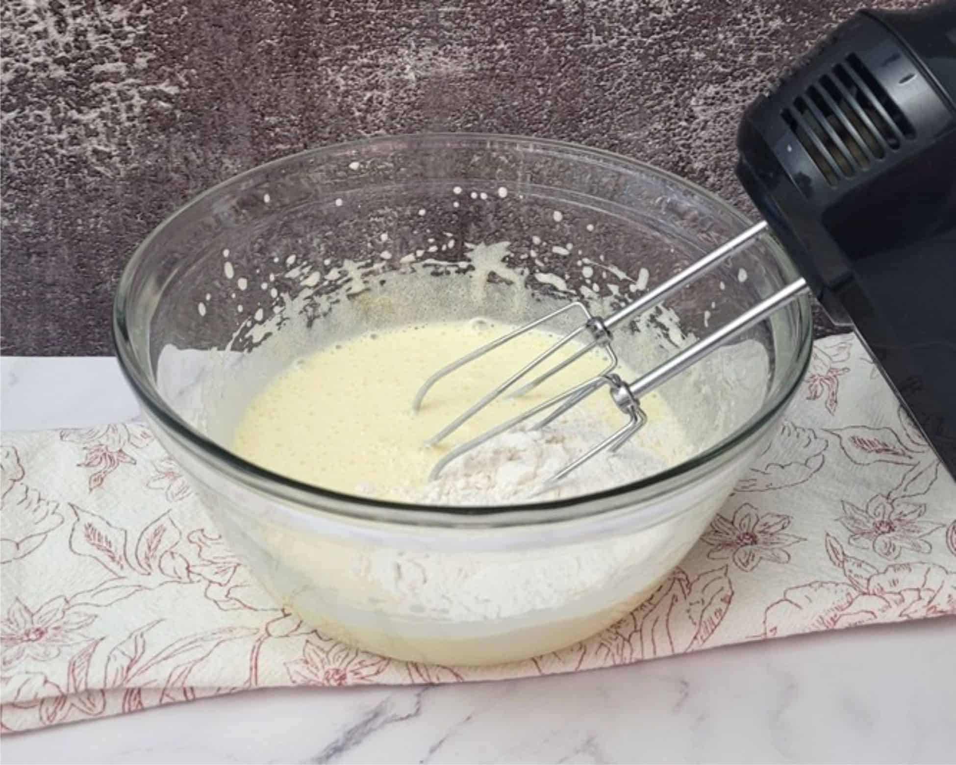 first measure of dry ingredients added to mixing bowl