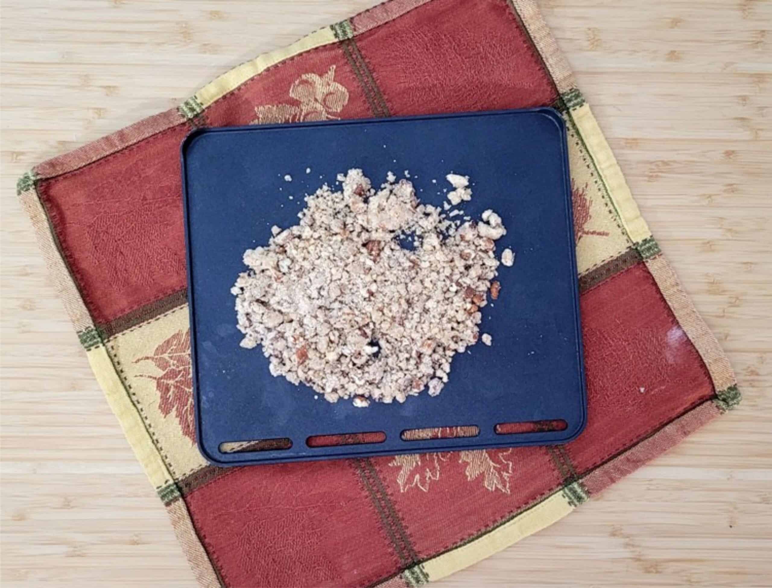 pecan streusel topping on a sheet pan before baking