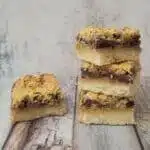 stack of cookie bars on a wooden countertop