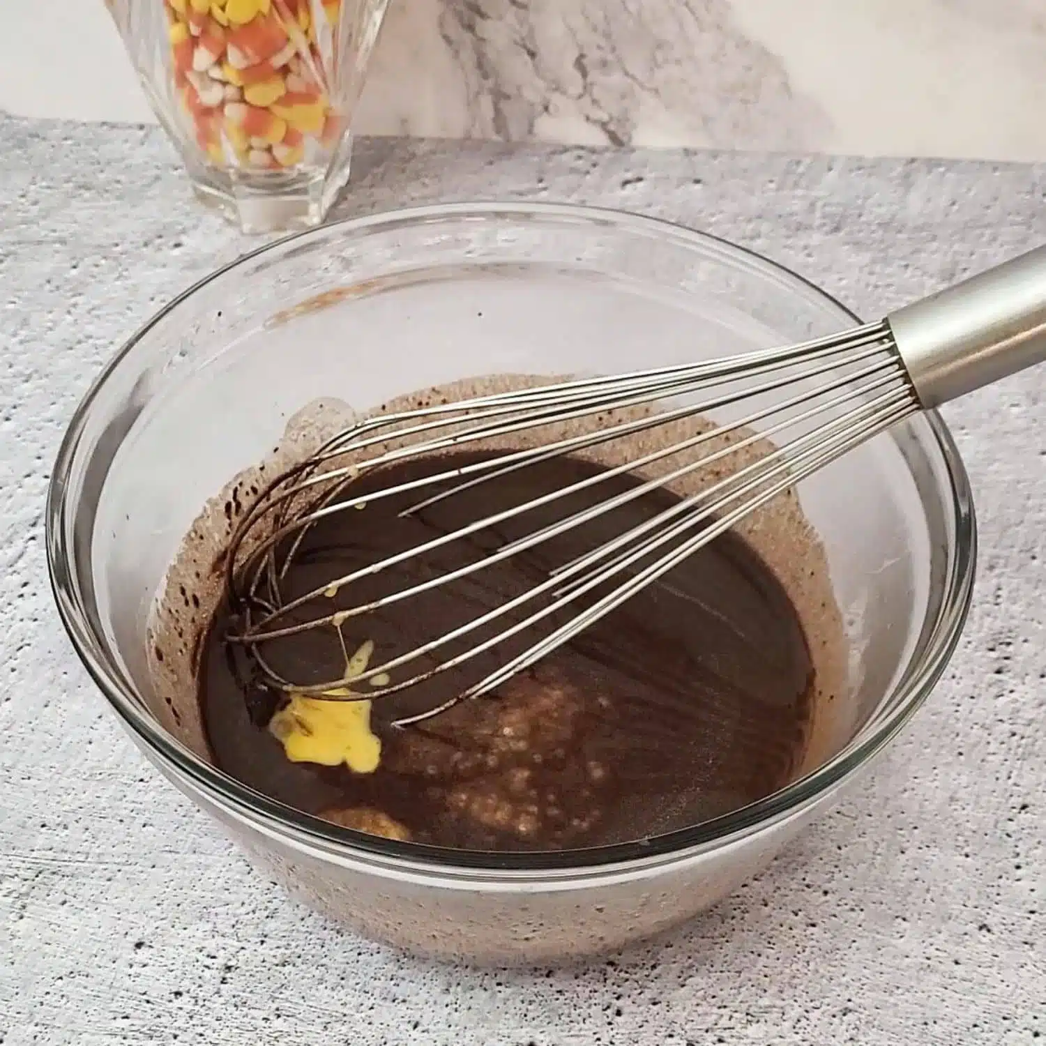 eggs and egg yolk added to mixing bowl