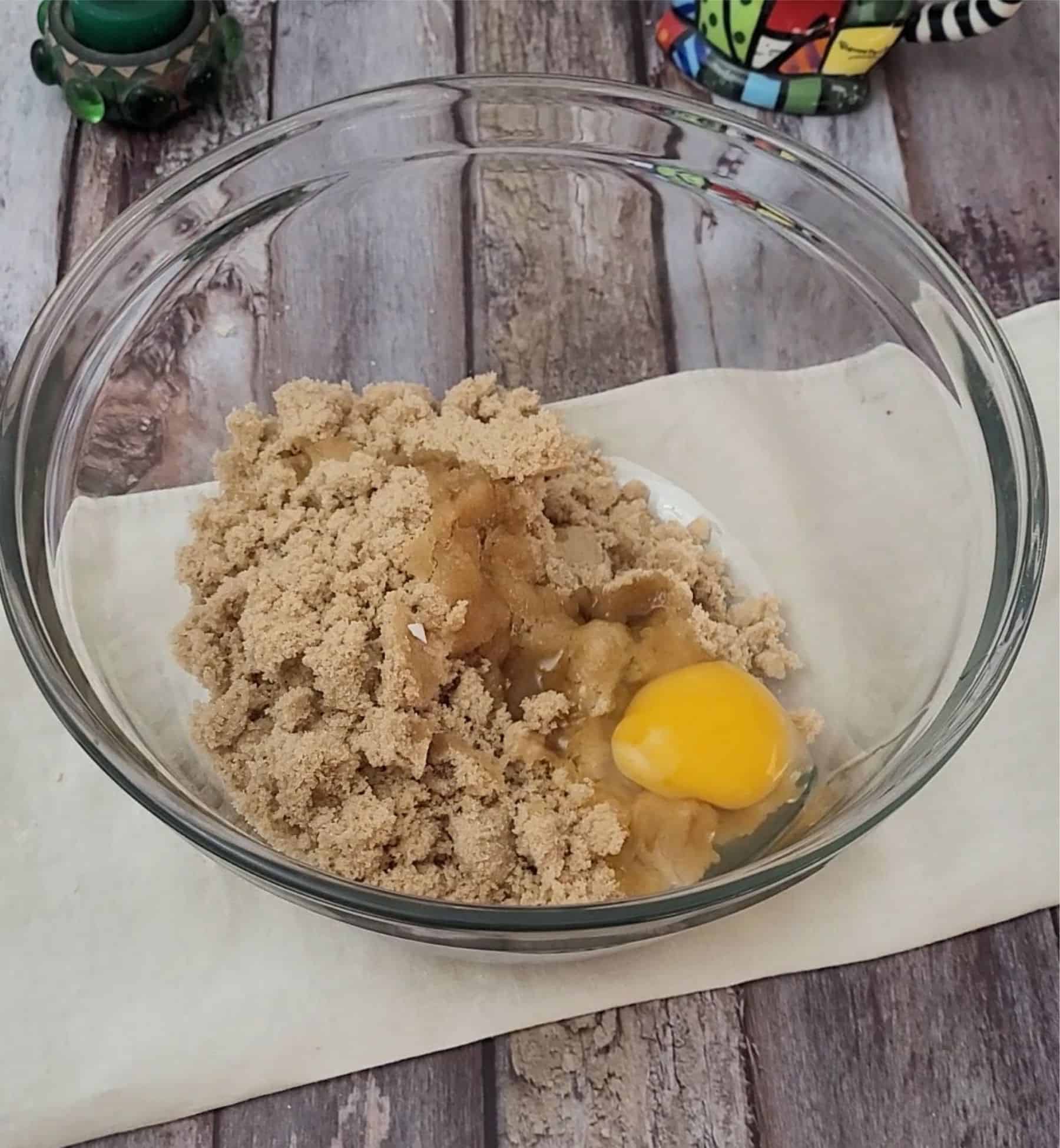 eggs and brown sugar in mixing bowl to make topping for cookie bars