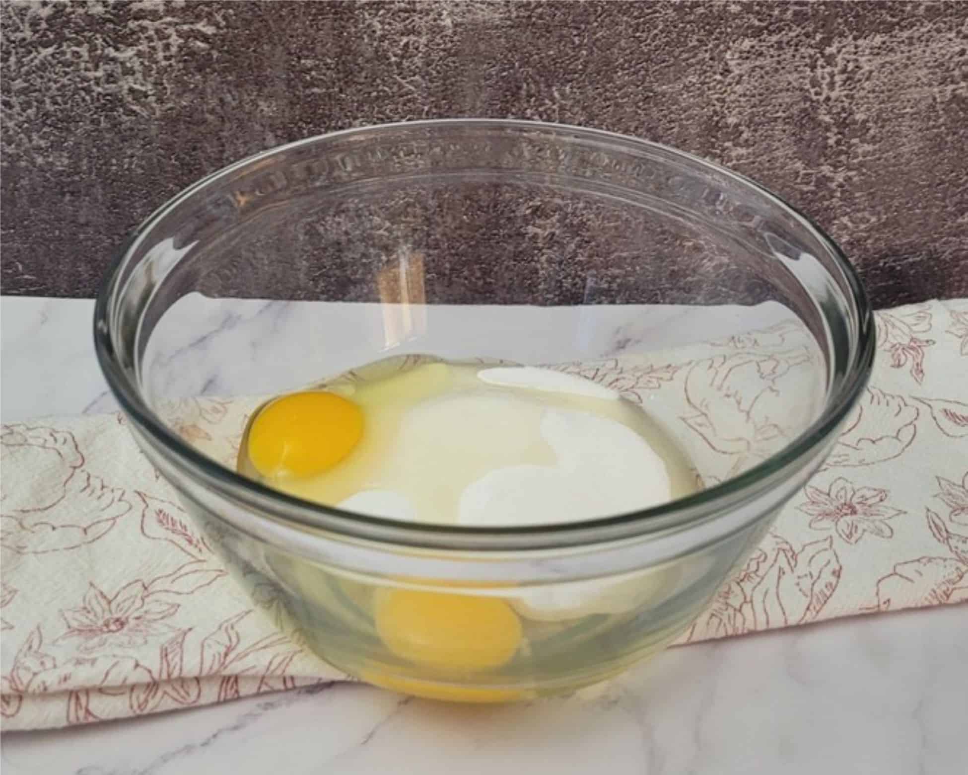 eggs and sugar added to mixing bowl