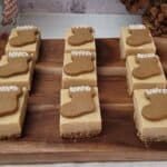 gingerbread fudge with cookie crust on a wooden serving platter