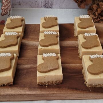 gingerbread fudge with cookie crust on a wooden serving platter