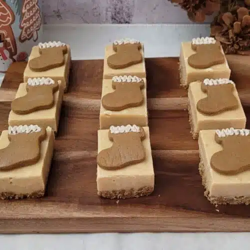 gingerbread fudge candy pieces with a gingerbread cookie stocking as decoration