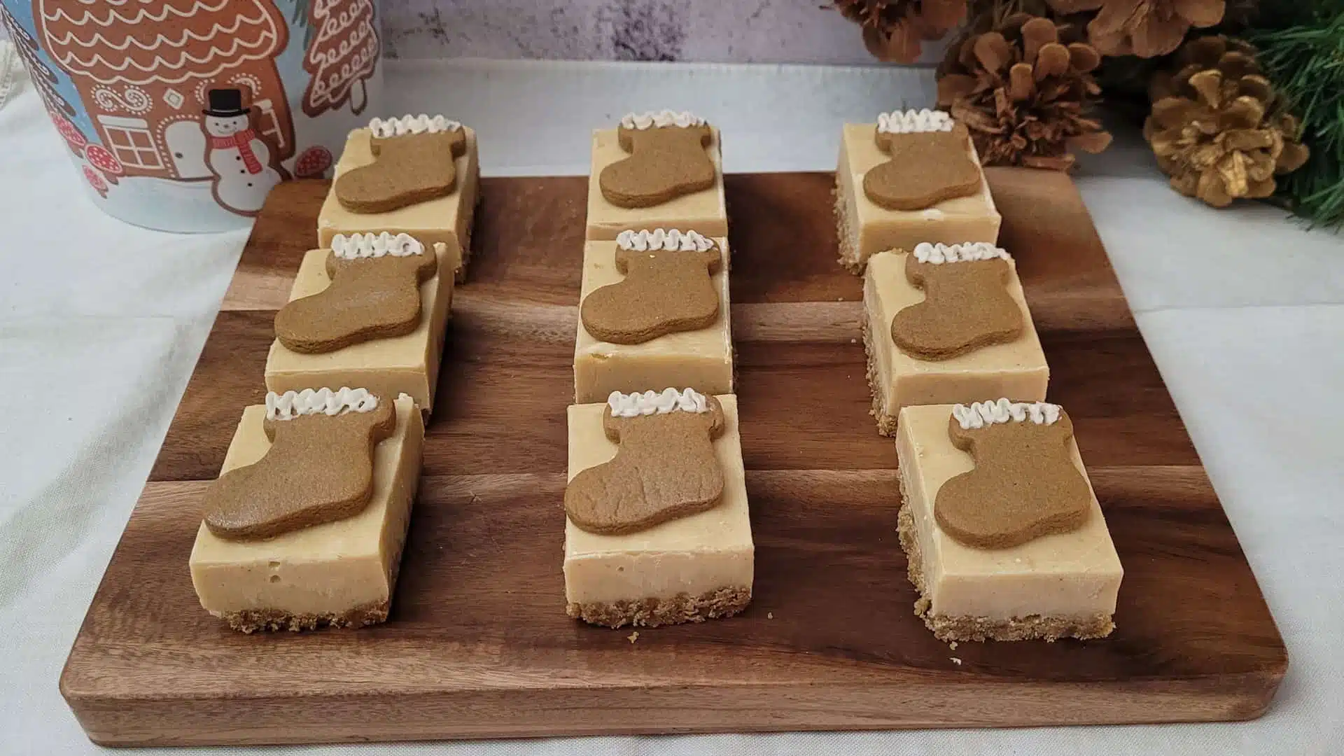 gingerbread fudge with cookie crust on a wooden serving platter