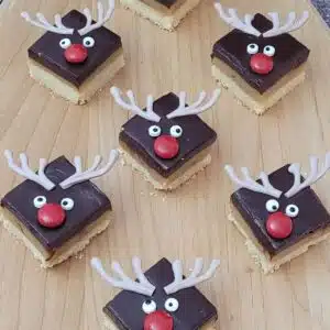 overhead view of shortbread caramel bars decorated like reindeer