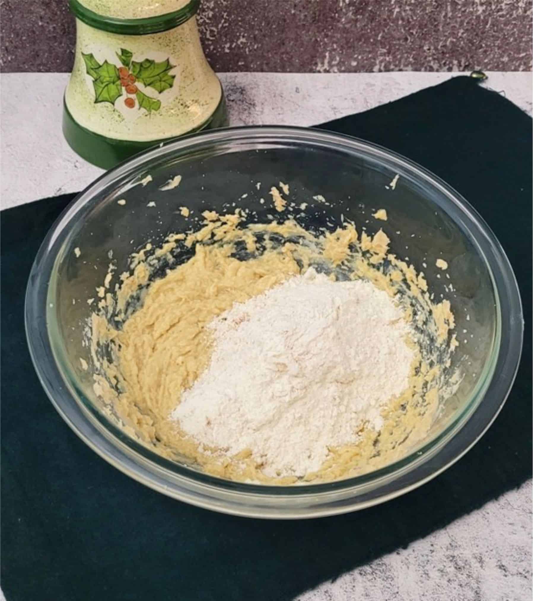 mixing bowl with first addition of flour and spices added