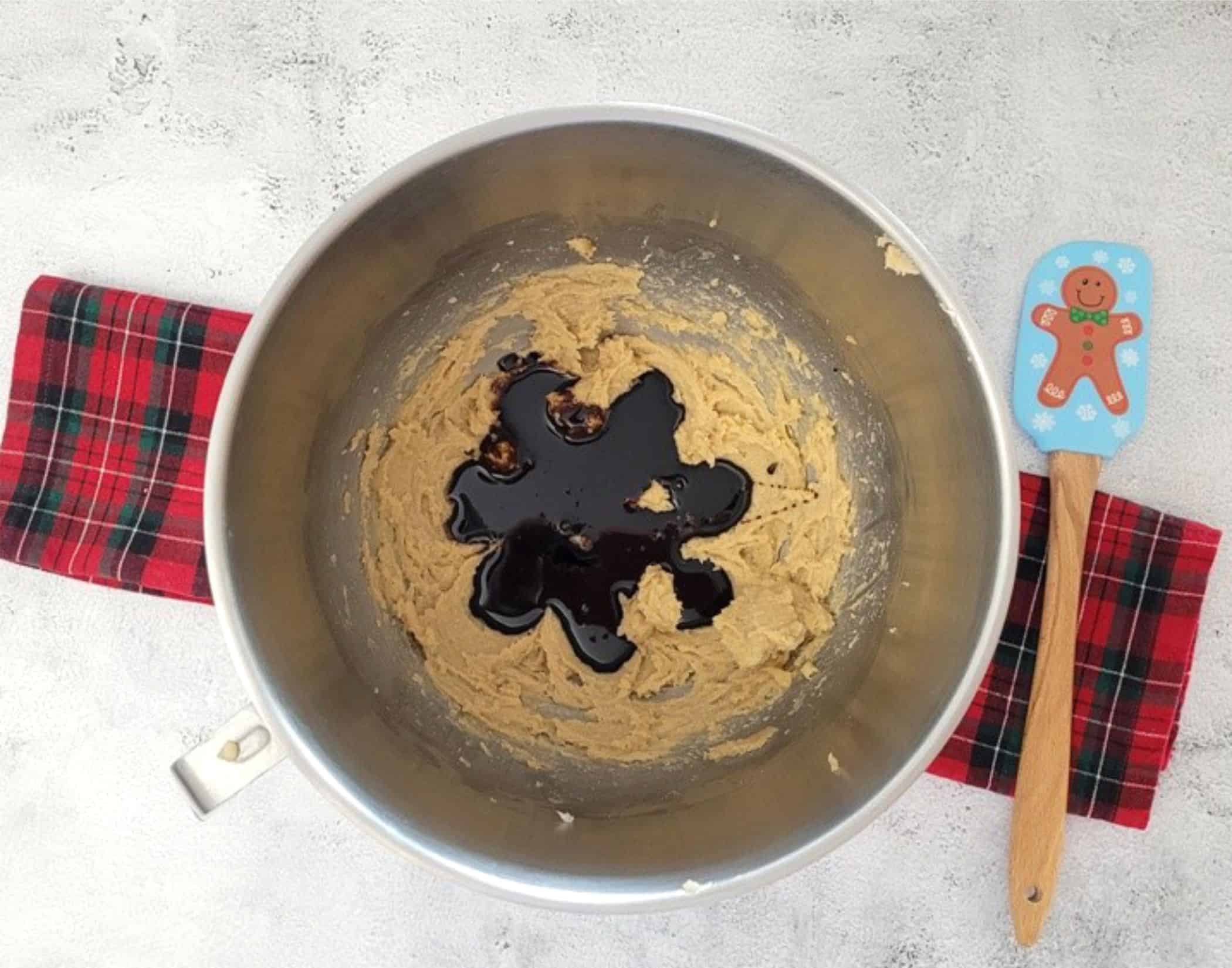 molasses added to mixing bowl to make gingerbread dough for cookies