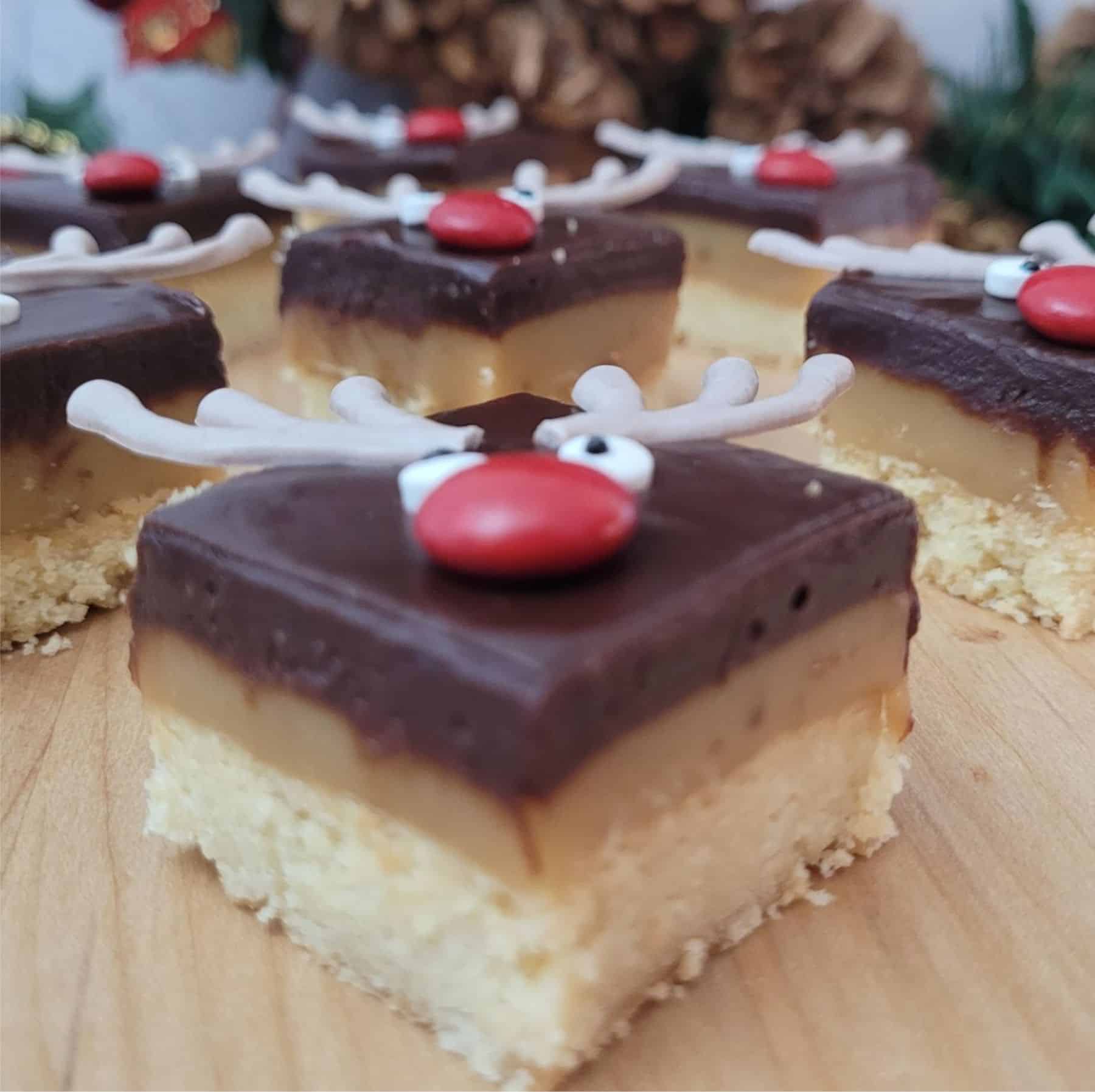 closeup view of layers of caramel shortbread chocolate