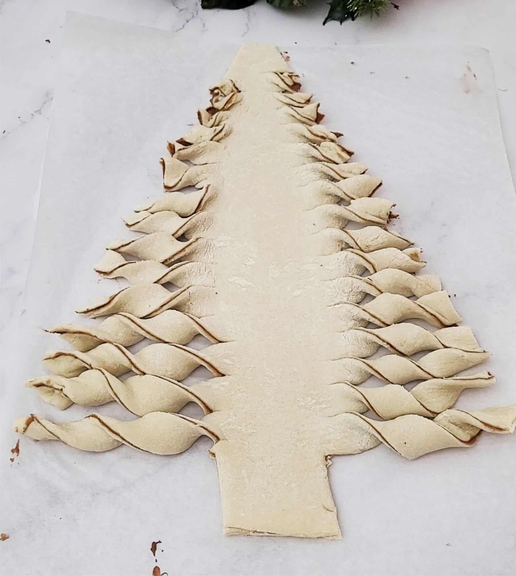 finished twisting edges on puff pastry to look like a Christmas tree