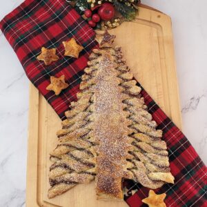 overhead view of tree shaped Christmas dessert on a serving tray