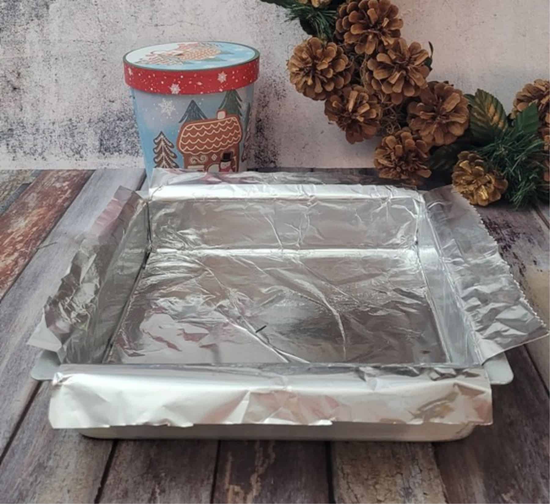 square pan lined with foil to prepare for fudge recipe