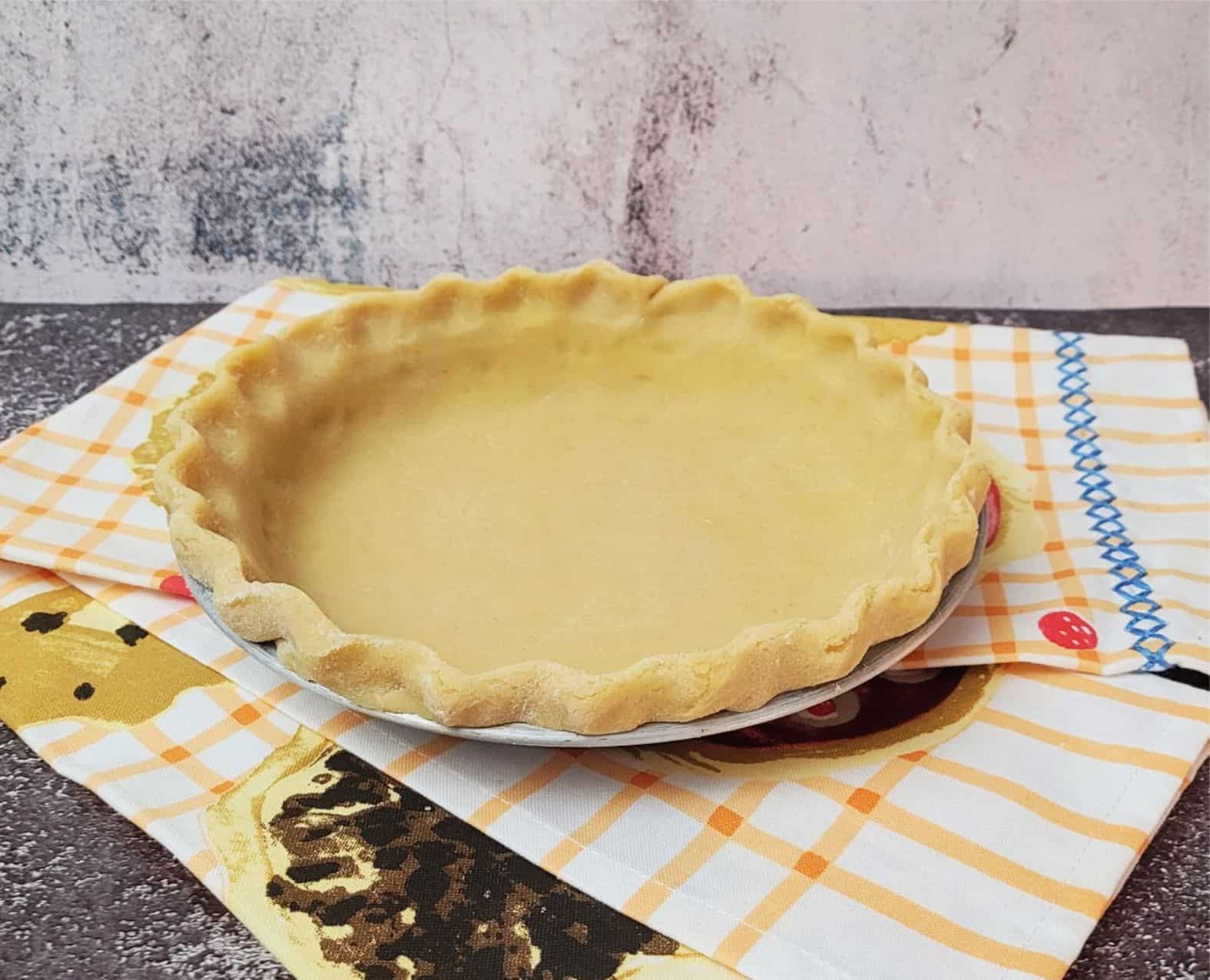 pie tin filled with easy gluten free pie dough