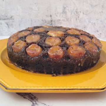 a banana chocolate upside down cake on a serving platter