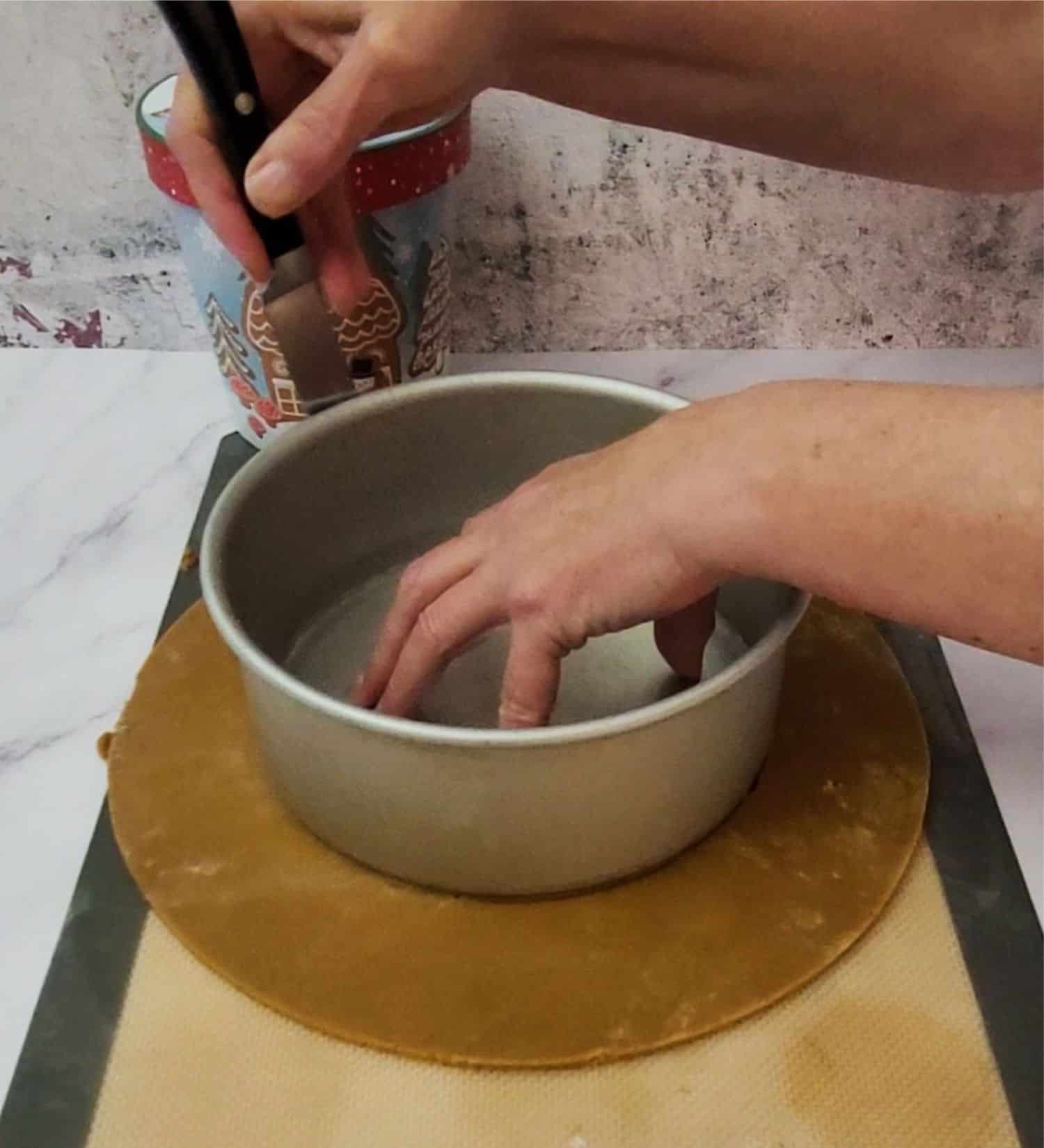 cutting two circles to make base for gingerbread cookie wreath