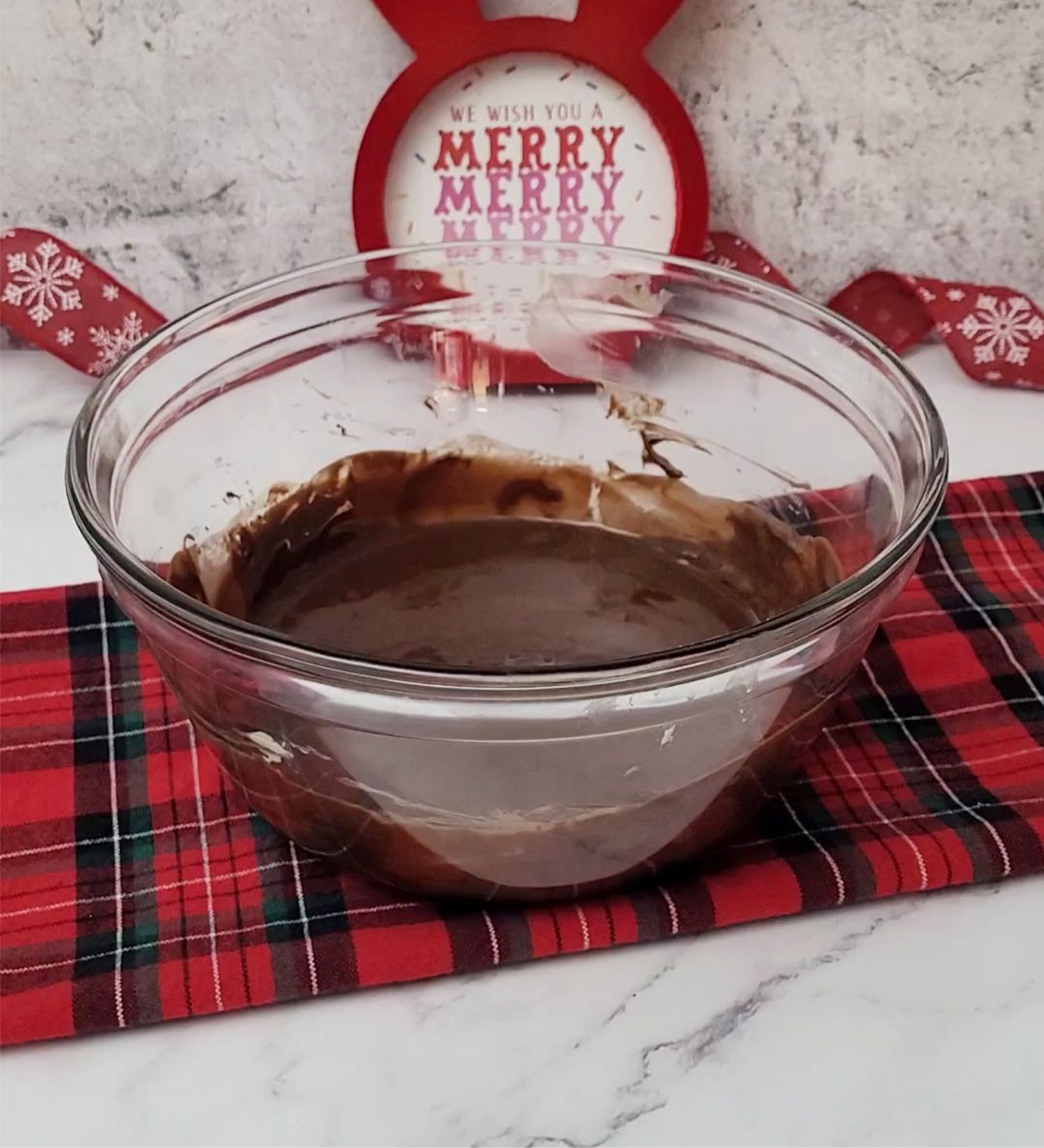 chocolate and butter melted together in a mixing bowl