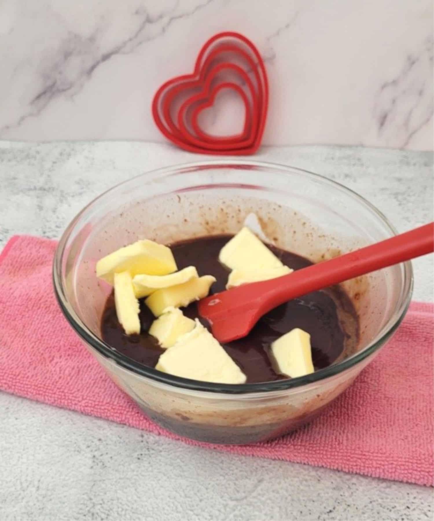 butter added to bowl to make fudge filling for heart inlay sandwich cookies