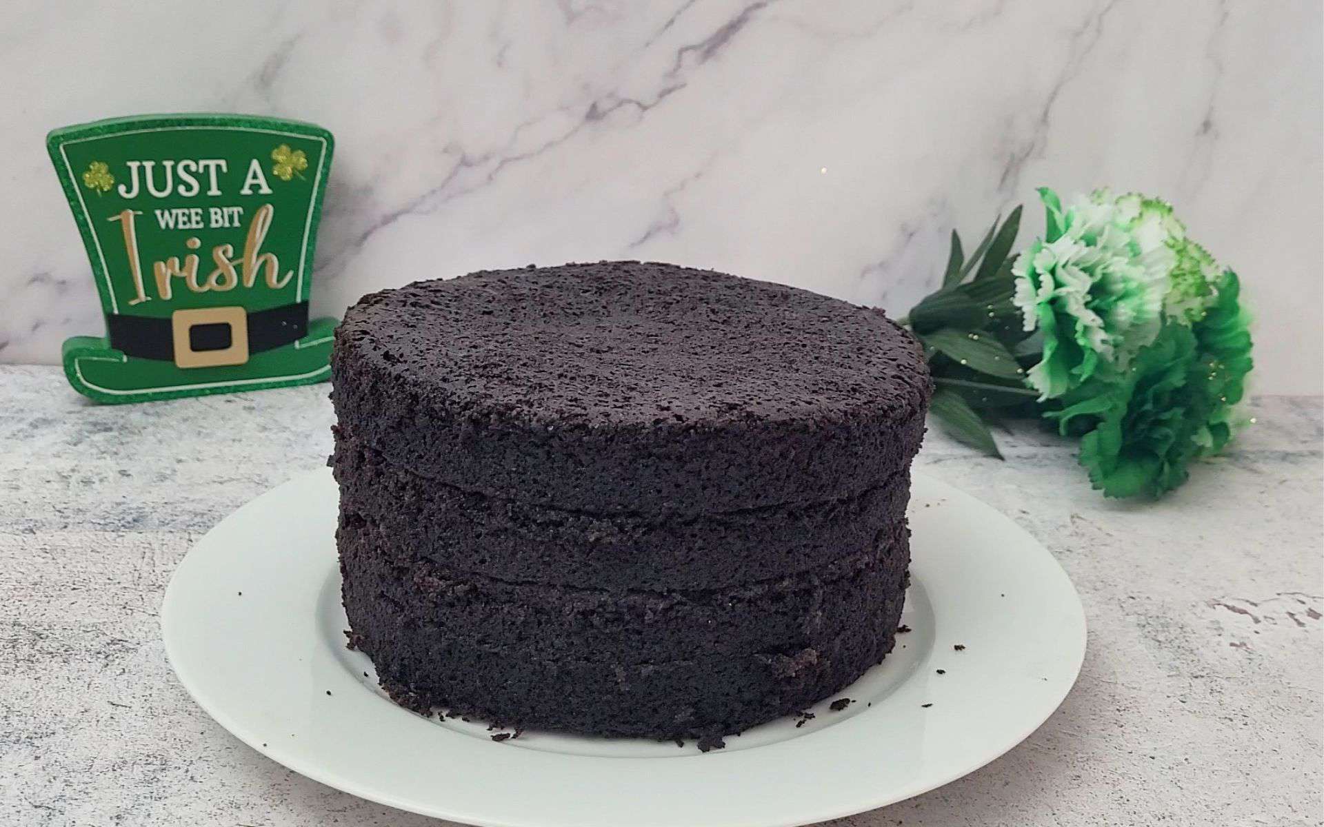 chocolate Guinness cake for St Patrick's day sliced into four layers