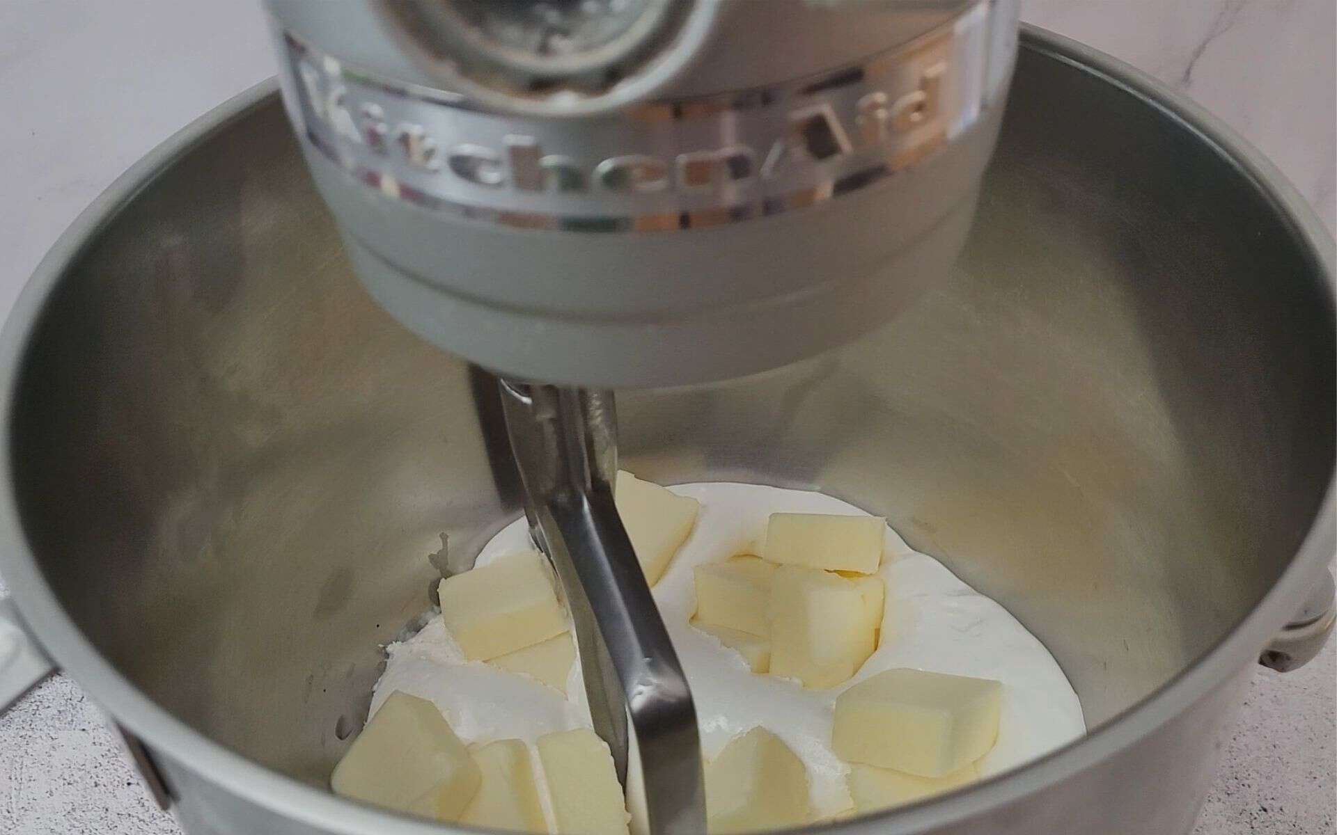 butter and marshmallow fluff in mixing bowl