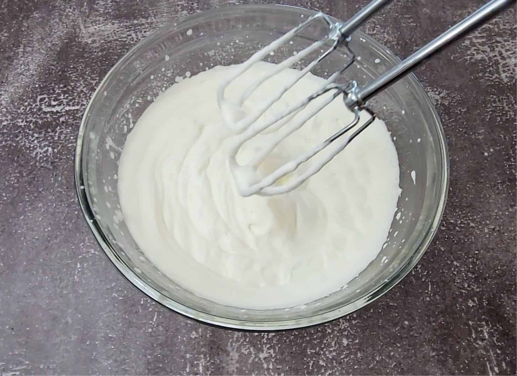 whipping cream in a mixing bowl and whipped to medium peaks before adding to cream cheese mixture