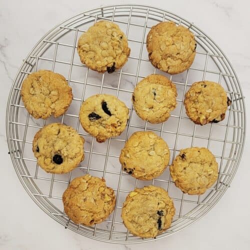 overhead view of oatmeal cookies made without eggs on a wire rack