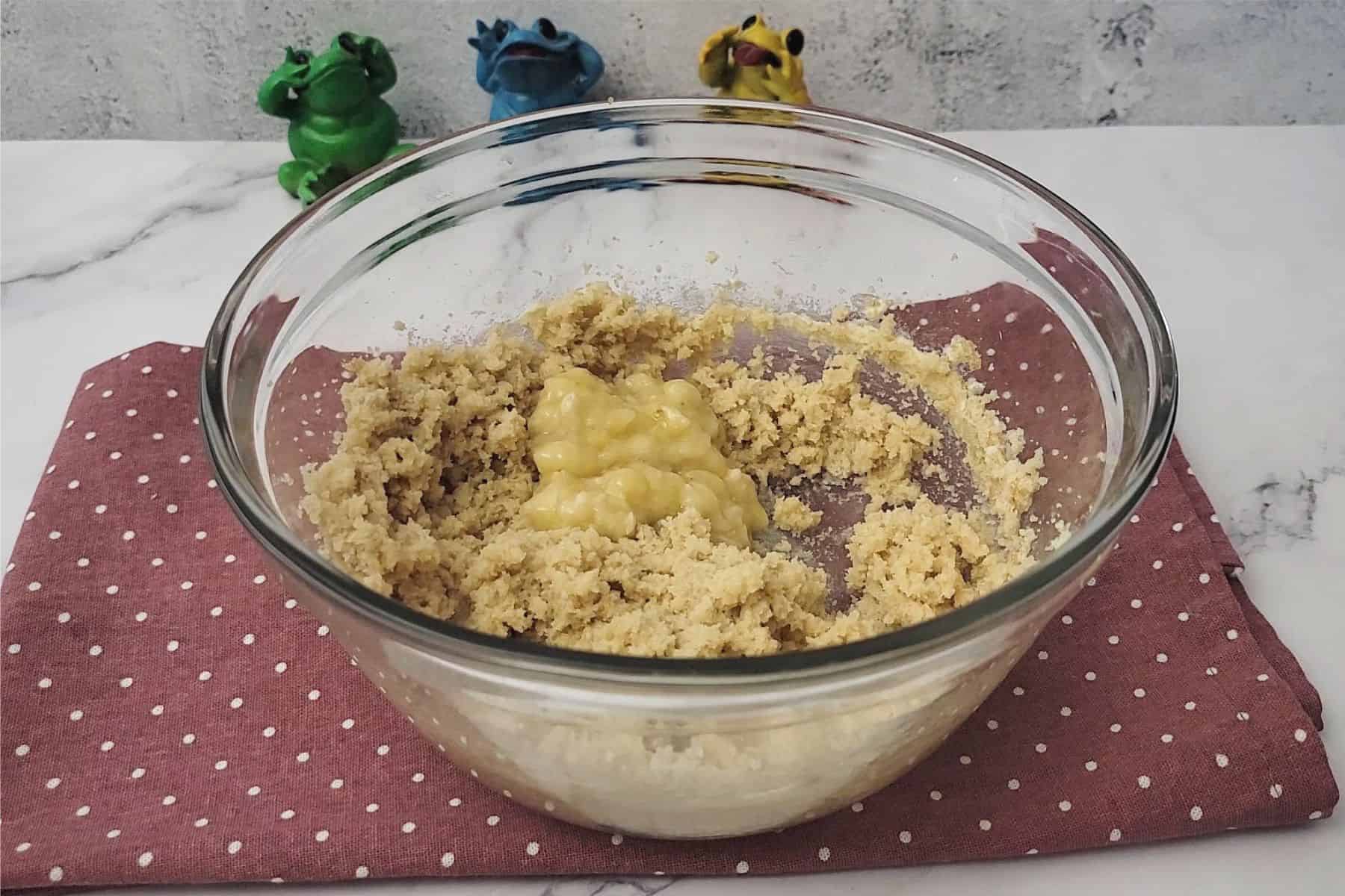 mashed banana added to cookie dough to replace an egg