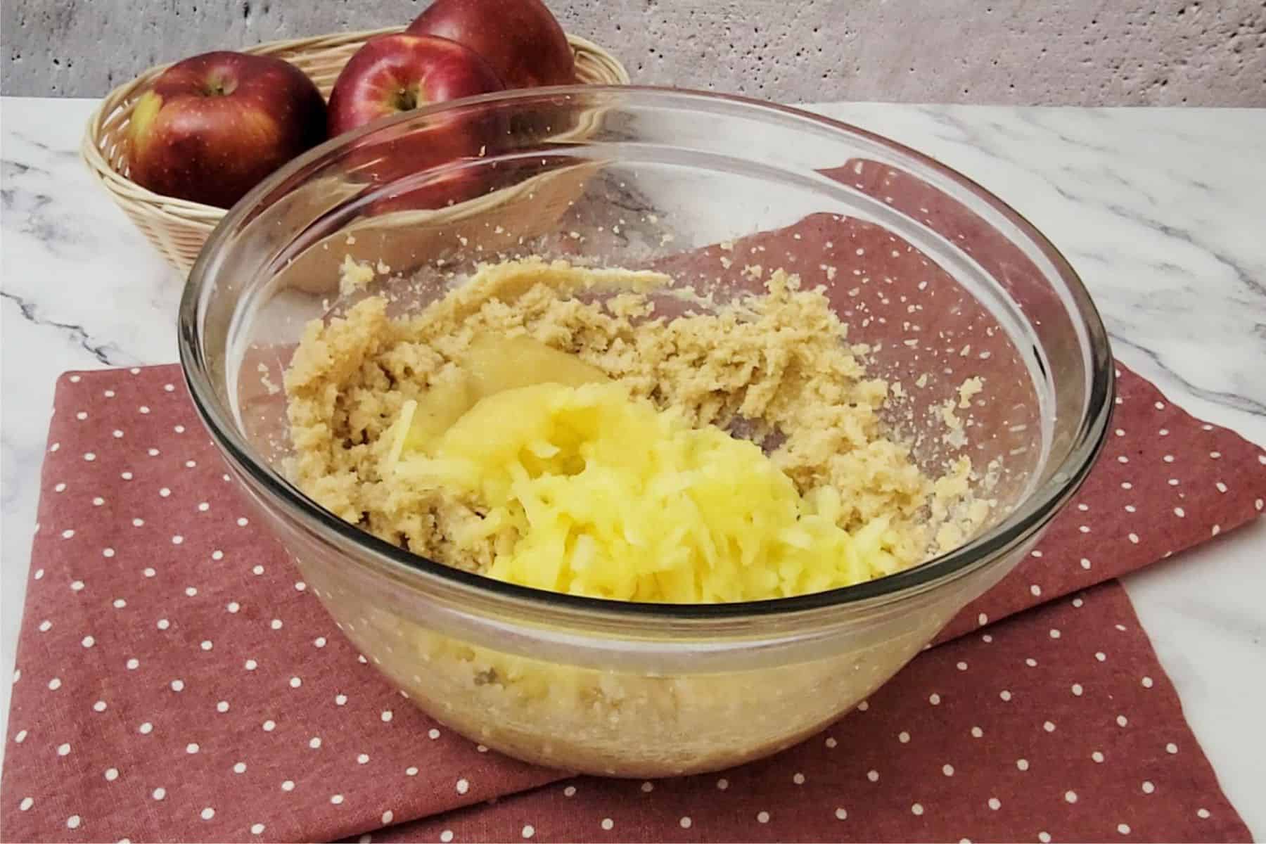 applesauce and grated apple added to mixing bowl