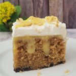 closeup of a slice of cake from recipe to make a peanut butter banana poke cake