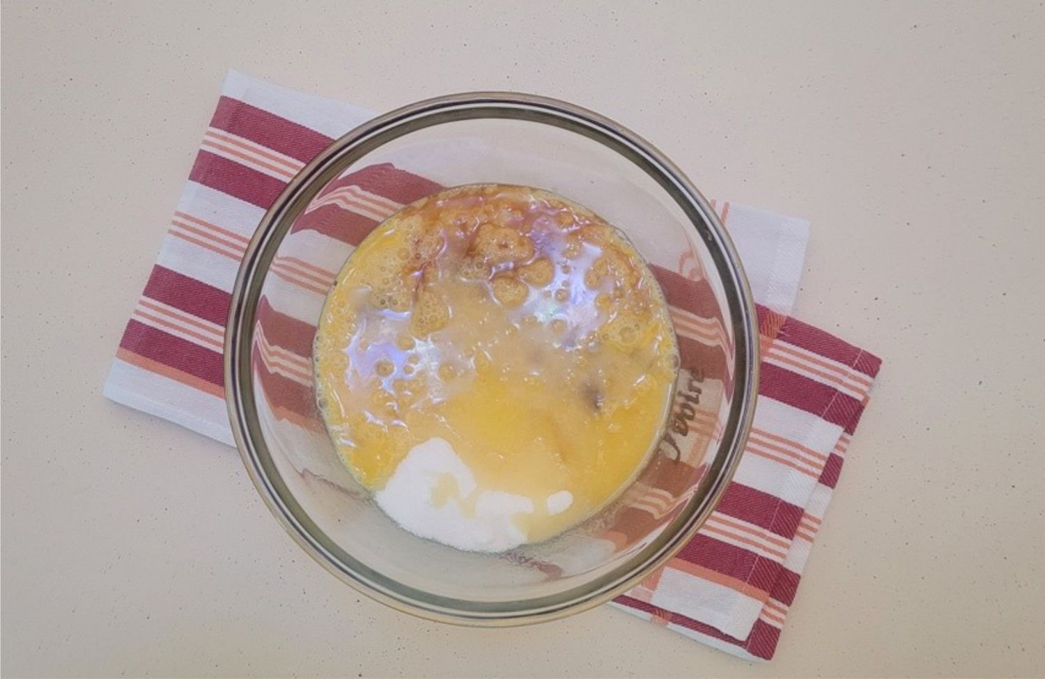all ingredients in a mixing bowl except pecans to make pie filling
