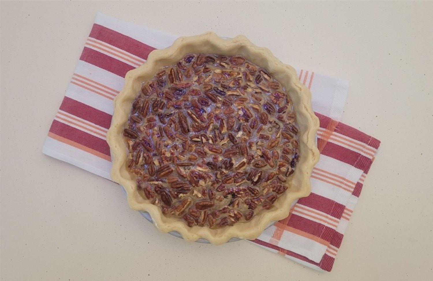 filling for pie poured into crust before baking
