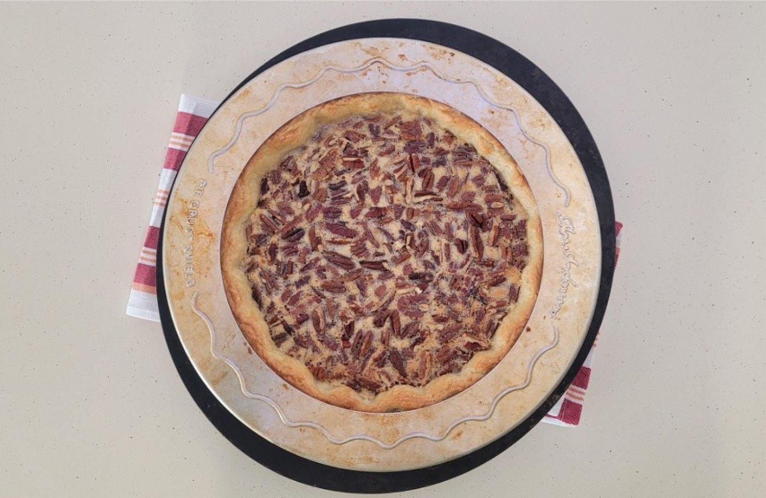pie crust shield on top of pie to prevent crust from burning